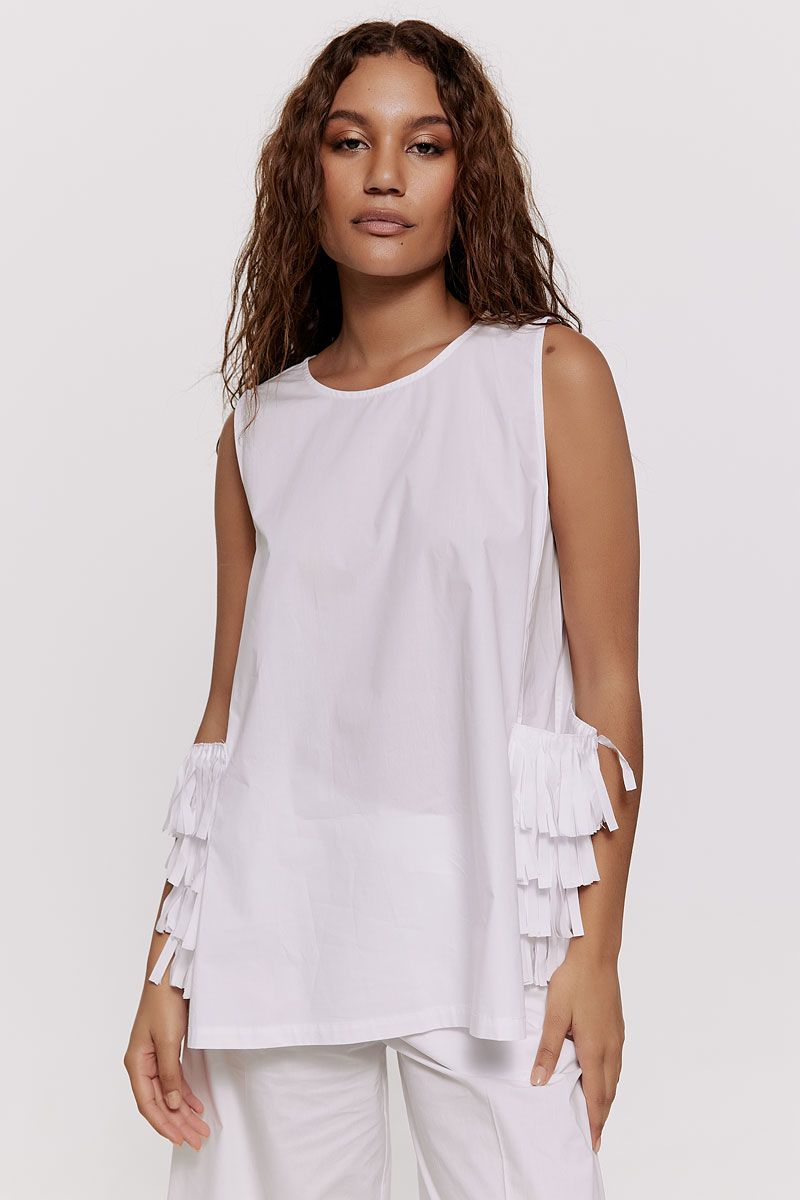 Top in white poplin with fringed details