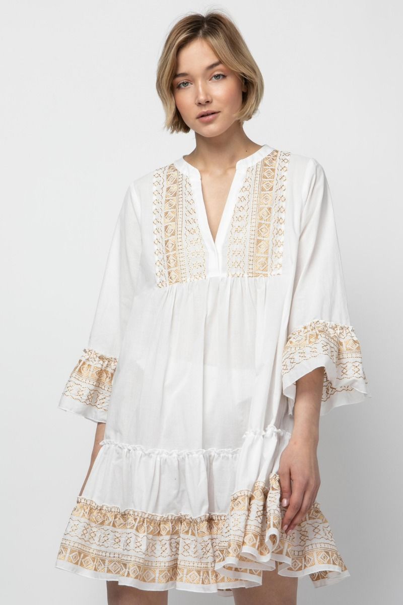 Dress in white with gold embroidery 