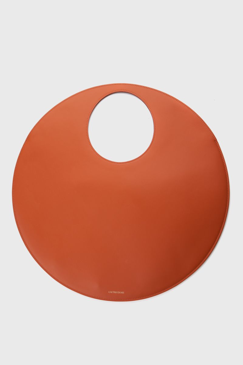 Round bag in two-tone orange and tan leather