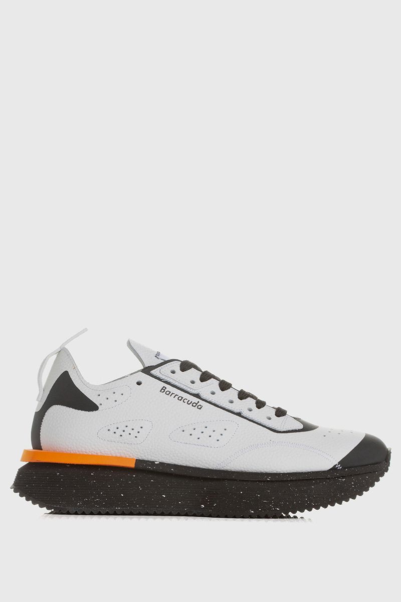 White sneakers with black and orange details