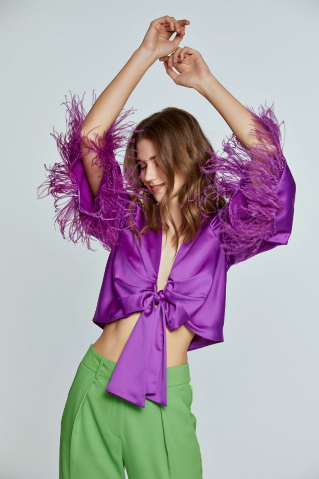 Cropped satin top embellished with feathers