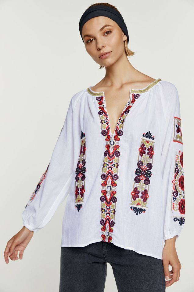 White blouse with embroideries