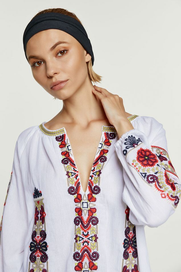 White blouse with embroideries