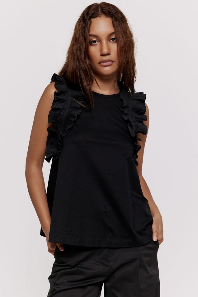 Black top embellished with ruffles 
