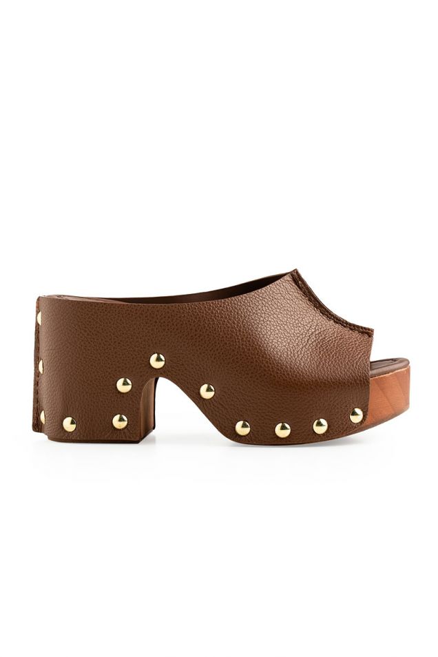 Studded leather clogs in brown 