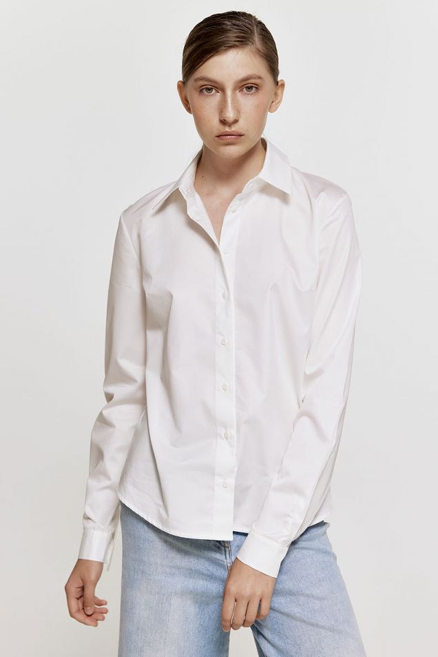 White shirt with fringes