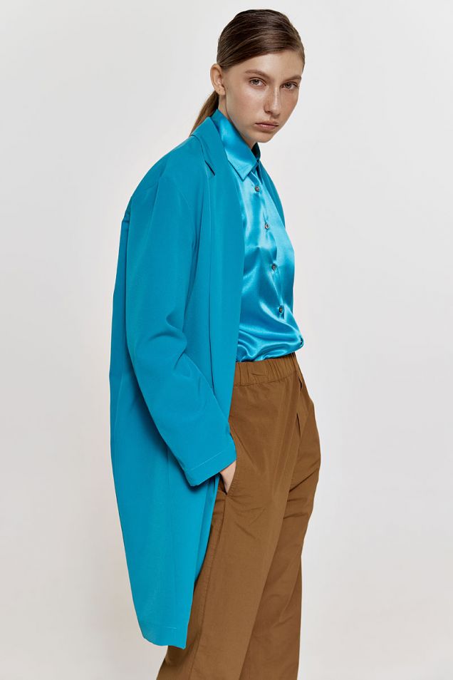 Oversized trench coat in turquoise
