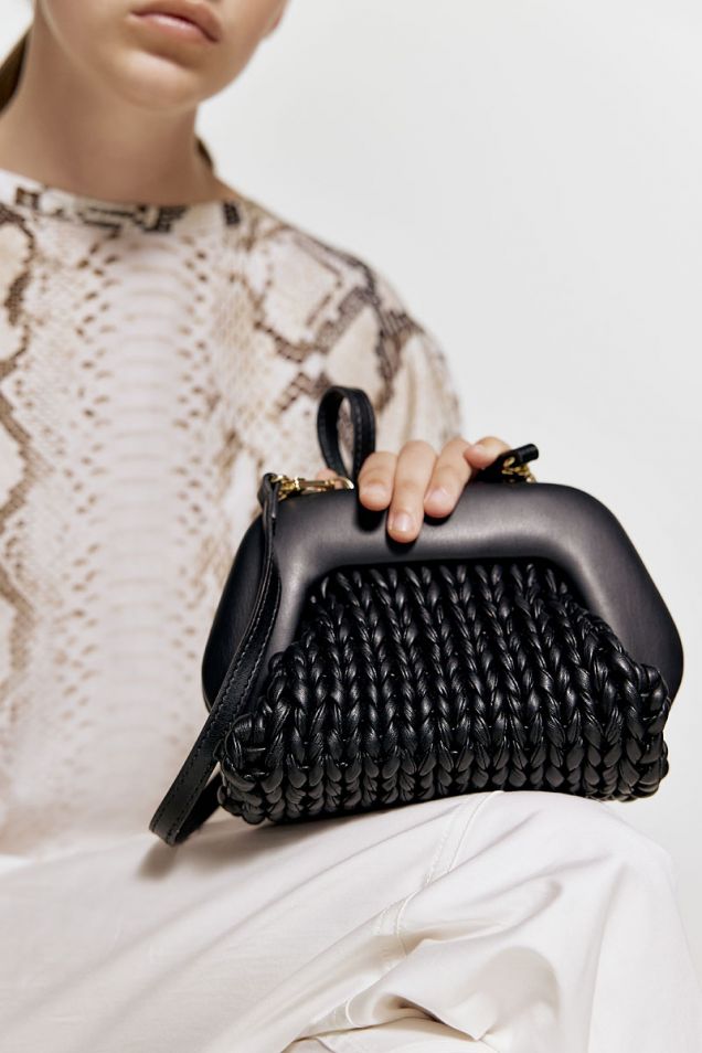 Knitted black clutch