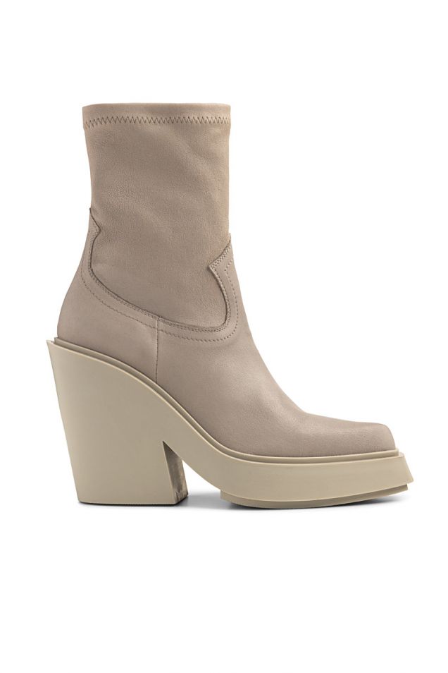 Tetrix stretchy ankle boots in off white