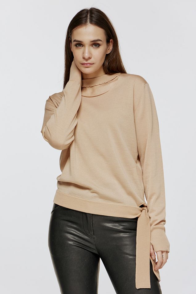 Sweater in merino wool with cut-out details and tie-up hems