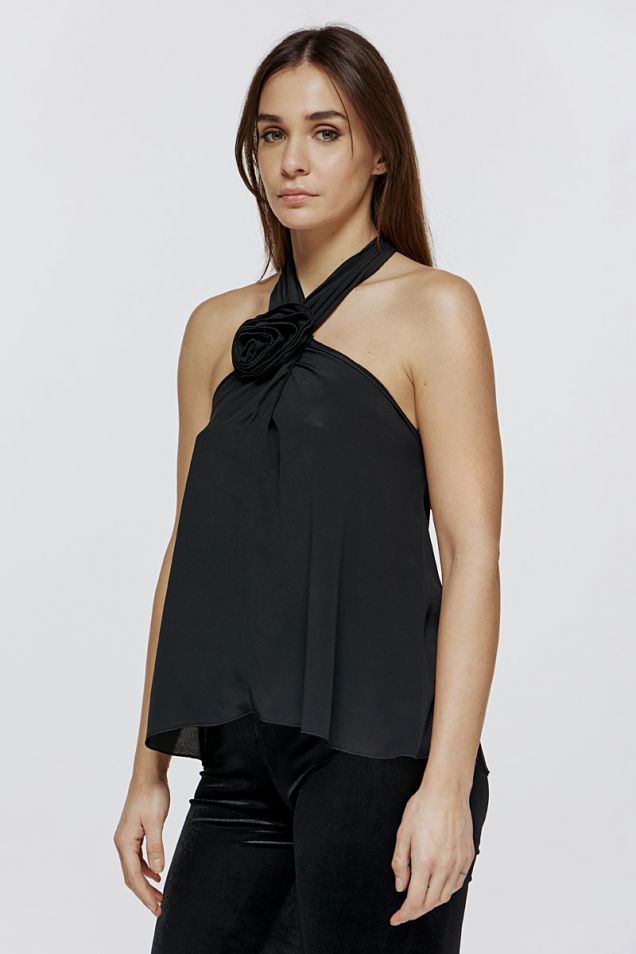Top in crepe de chine with twisted neckline and flower