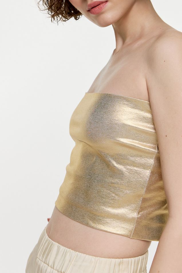 Cropped strapless top in gold