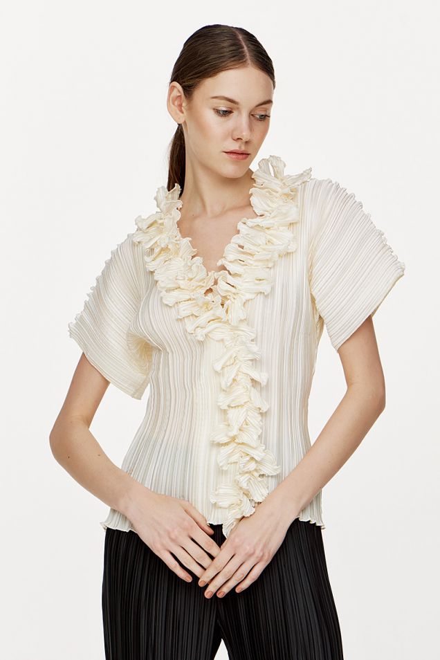 Pleated top with ruffled details