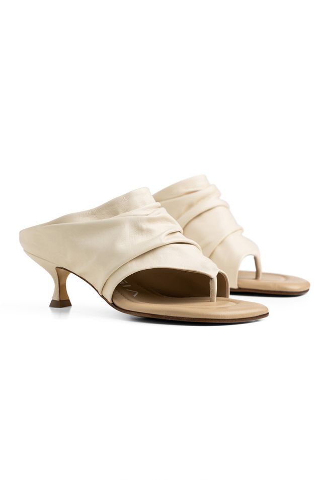 Leather mules in ivory hue