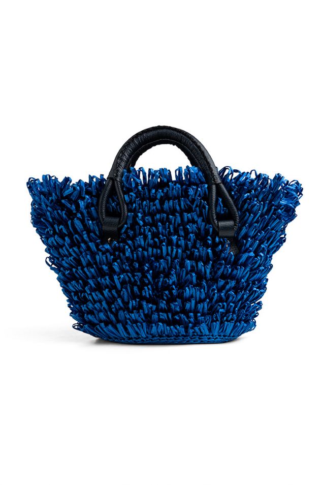Woven straw basket with leather handles