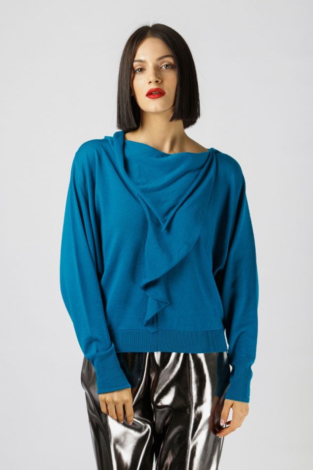 Knitted blouse in vibrant turquoise color